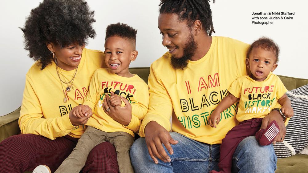 A family dressed in matching yellow shirts