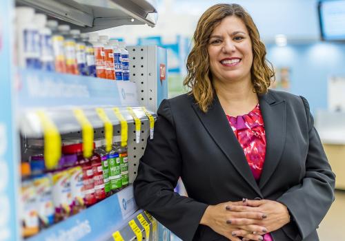 A woman in a drug aisle