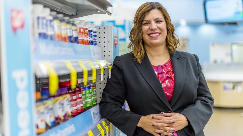 A woman in a drug aisle