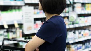 a shopper in a wellness aisle